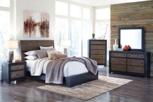 Bedroom set with area rugs layered